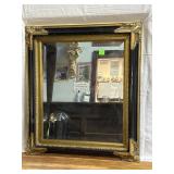 Beveled Mirror with black and gold gilt frame -