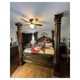 Four poster pedestal bed with leather headboard an