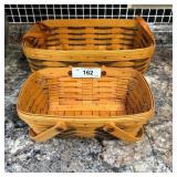 Two Longaberger baskets with handle