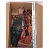 LOT OF SMALLER BRANDED LEATHER HOLSTERS