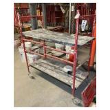 RED COLLAPSABLE ROLLING SCAFFOLDING