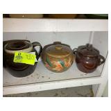 SHELF OF VARIOUS COOKIE JARS