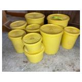 LARGE GROUP OF YELLOW TUPPERWARE CANISTERS