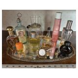 Mirrored tray of perfumes vintage Revlon lipstick