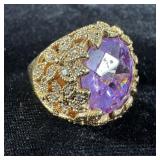 Large gold finish purple rhinestone designer ring