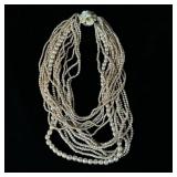 Vintage signed Miriam Haskell Faux pearl strand >>