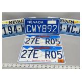 South Dakota and Nevada license plates