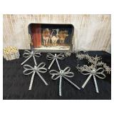 Metal cow tray, metals bows, wood fence