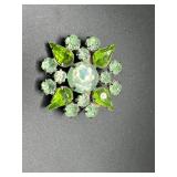 Green rhinestone brooch