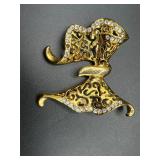 Gold tone Ribbon Bow Brooch with rhinestones.