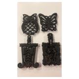 Cast iron trivets, owl, butterfly, stamped M1,