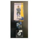 Erik Johnson autograph puck with statue (NIB)