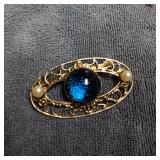 Gold Toned, Blue Center Stone Brooch