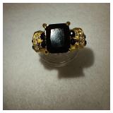 Gold Toned Ring with Cut & Faceted Black Stones