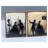 Pair of Antique reverse painted silhouettes