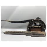 Antique cast-iron star tobacco cutter