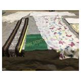 Lot of table runners, rugs, curtains, shower