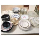 Group of misc. dishes on kitchen island