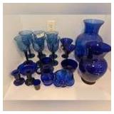 ALL BLUE GLASS ITEMS ON COUNTERTOP MARKED 1218
