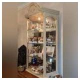 ILLUMINATED CURIO HUTCH WITH GLASS SHELVES AND MIRROR BACK