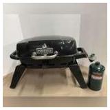 Master Forge table top grill, comes with one canister, see pictures for details.