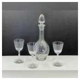 Vintage etched one decanter with stopper, this piece has a grape and leaf motif also comes with three stemmed sherry glasses, see pictures for details.