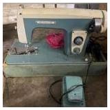 Vintage wizard sewing machine with storage case, and more, working condition unknown see pictures for details.