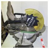 Hitachi brand 10 inch compound miter saw. DOES POWER UP