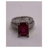 SILVERTONE RING WITH LARGE RED EMERALD CUT FACETED CENTER STONE SIZE 6 - CHECKOUT