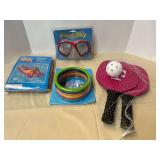 Assorted beach toys and more, still new in packaging, tub is not included, see pictures for details.