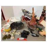 Assortment of kitchen and home decor to include duck figurines, one is vintage Avon, milk glass baking dish, basket, train engine and log cabin crafted from coal, and more. See pictures for details.