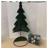 Metal Christmas tree with stand, also includes Christmas ornaments, see pictures for details.