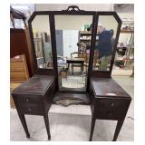 Vintage vanity with trifold mirror, has four side drawers, see pictures for details.