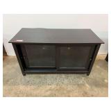 Sliding glass front door TV/entertainment stand, see pictures for details.