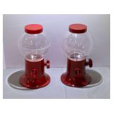 Plastic gumball machines, set of two, see pictures for details.