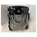 Ladies striped rolling tote bag, see pictures for details.