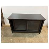 Sliding glass front door TV/entertainment stand, see pictures for details.