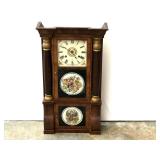 Seth Thomas 8-day double-decker weight clock, the glass fronts are reverse painted, weights are included, seller states this piece works, see pictures for details.