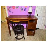 BR4…Artists wooden worktable/desk with slanted top, does have wear, has a side table for extra storage, also comes with a swivel chair, and desk lamp, see pictures for details.