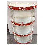 Four shelf Coca-Cola shelving unit, see pictures for details.