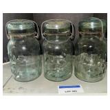 3 Light, green wire and Bail fruit jars / Ships