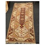 TAN AND RED RUG RUNNER 47" X 87"