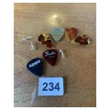 GUITAR PICKS INCL. ZIPPO, FENDER,