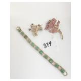 BRACELET WITH GREEN STONES ON SILVER TONE PLATES