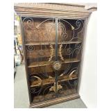 DISPLAY CABINET WITH WROUGHT IRON DOORS..