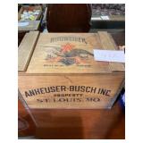 Anheuser-Busch wooden box with empty beer bottles