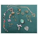 Pretty green lot of costume jewelry, plus