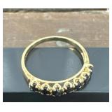 10k Gold ring with dark blue stones