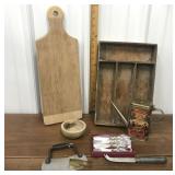 Cutting board, wood bowl, tongs, knives,