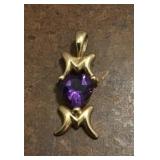 10k gold pendant with purple stone